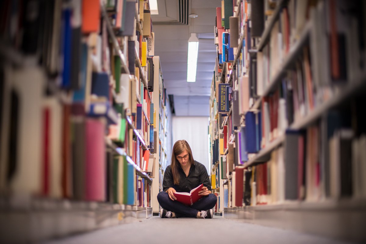 uglibrary's tweet image. #Reading in the stacks. Have a favourite reading spot at @uglibrary? Tag us or use #McLaughlinLibrary to share your pic with us!