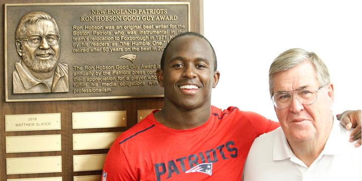 Patriots's tweet photo. Matthew Slater, recipient of the 2016 Ron Hobson Media Good Guy Award, poses with Ron Hobson himself inside the #Patriots media workroom: https://t.co/G2QliM0gN9