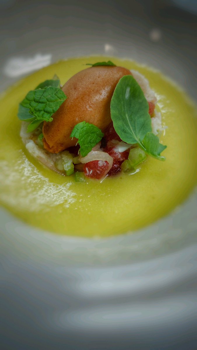 The most delicious way you can cool off: chilled watermelon gazpacho with lump crab, pickled shallots, bloody mary sorbet, spearmint.