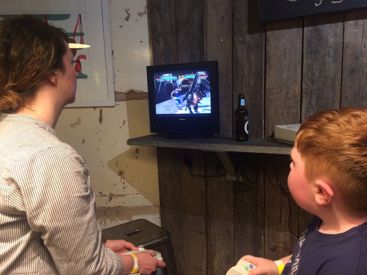 Retro monthly video games night @ #plascoffi #woodfired. Mother &amp; son having fun on Vintage Dreamcast Soul Caliber! Check FBk for details.