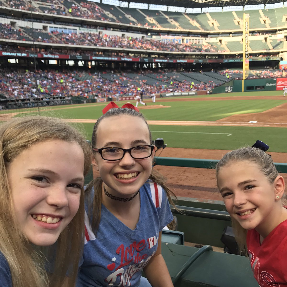 willey_brian's tweet photo. Yu Darvish's last game in a Rangers uniform?  These girls hope not!  #Rangers #weloveYu https://t.co/DFb9j83gL5