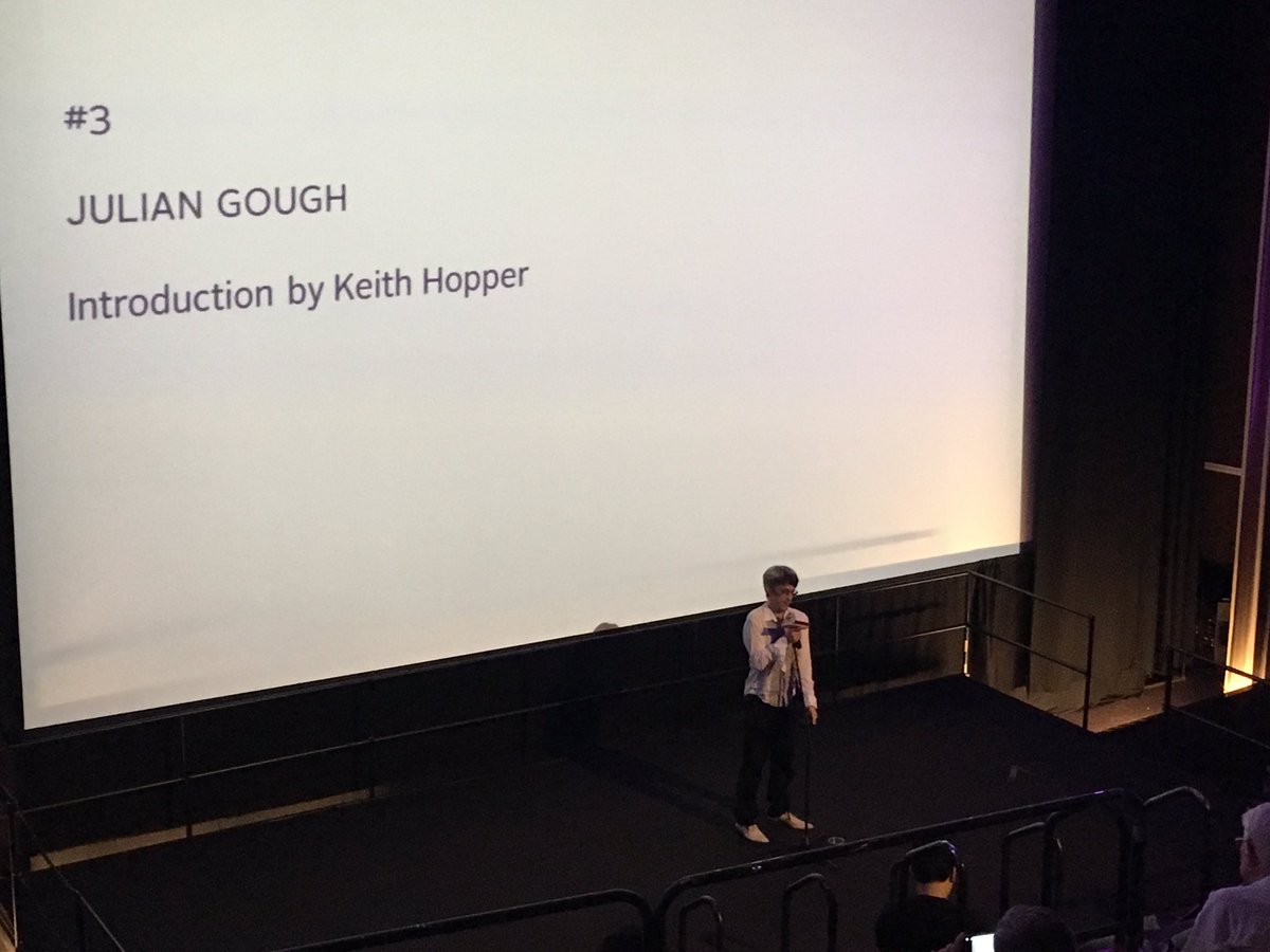 Irish_Lit's tweet photo. Julian Gough reads from new futuristic story. He chose to read it after playing  #joycestick video game based on Joyce's Ulysses #iasil2017 https://t.co/dx7YhPPqHL