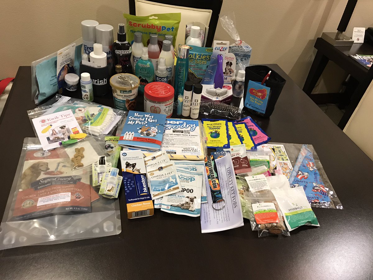 I love free stuff! Check out all this #swag from #superzoo. Can't wait to try out all the new products on my pups. #jackpot