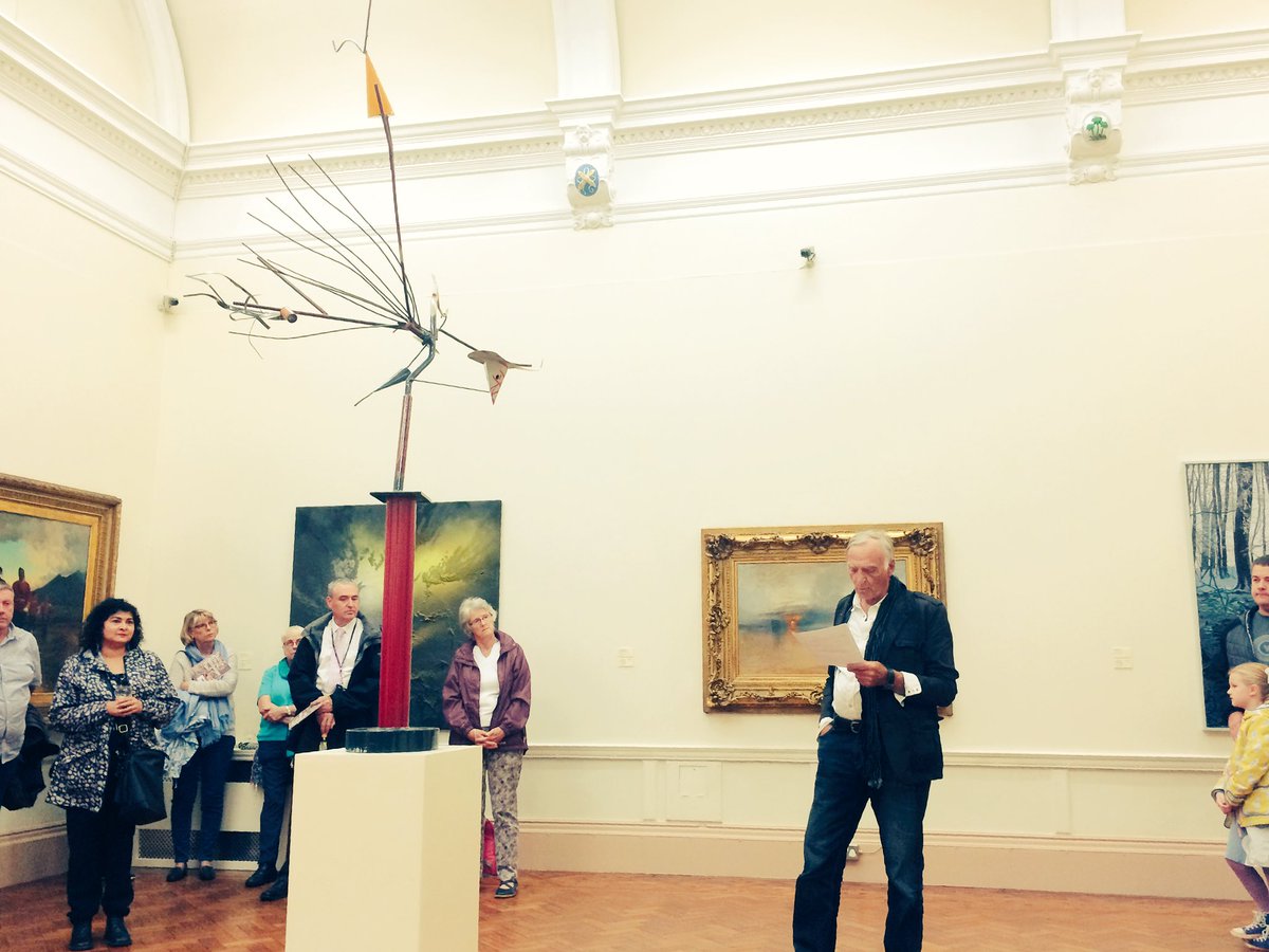 Sculptor Auke de Vries talking to guests ahead of his new public sculpture opening today in Burrs Park