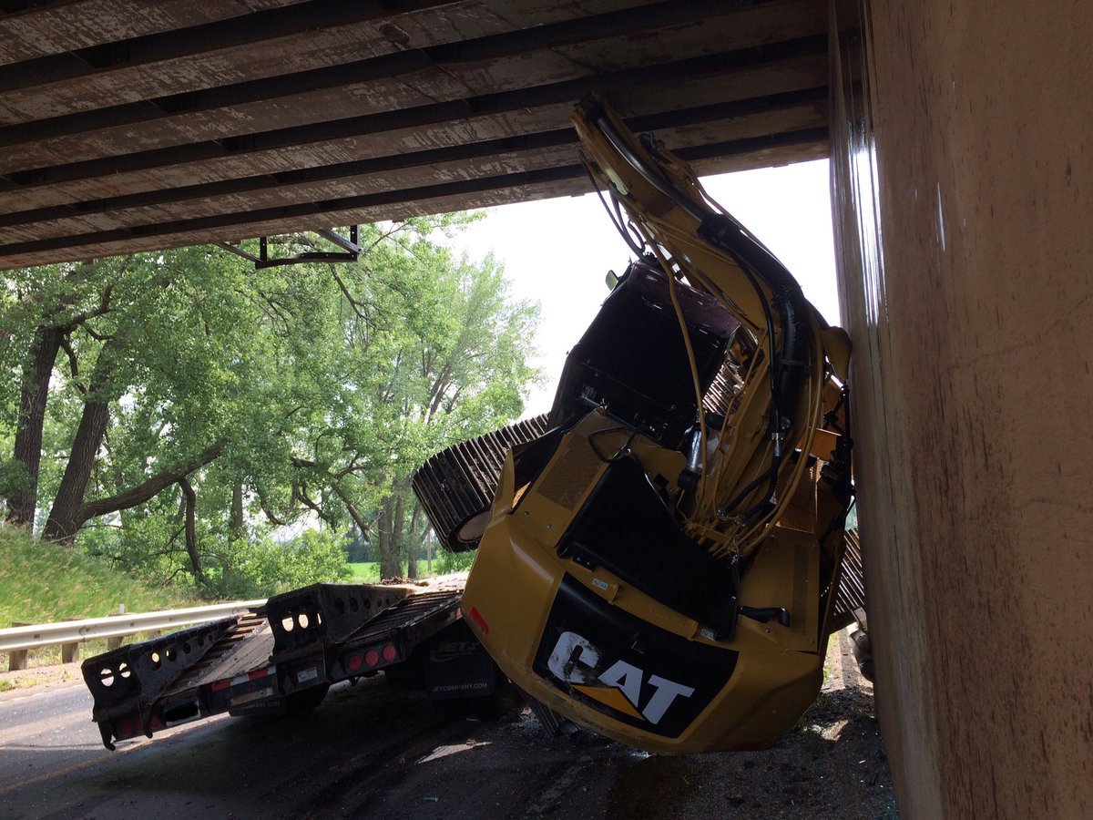 MSPPIO_NW's tweet photo. #MSPcrash Hwy9 south of Hwy10 (Clay County) semi SB loaded w/excavator hit the railroad overpass. No inj. Reduced to 1 lane. MSP invest https://t.co/fne8VfCnRC