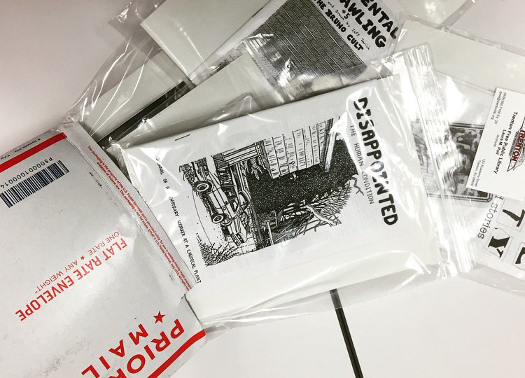 New Zine Alert! We just got a delivery of a bunch of cool new zines! Come and get ‘em while they’re hot! #JPLZineTeam 📦 📚