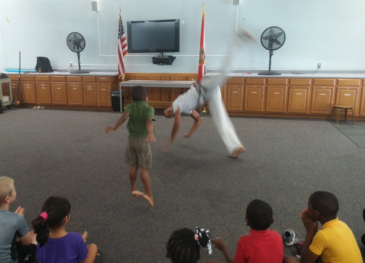 alachualibrary's tweet photo. Kids watch Brazilian martial art #Capoeira and try some moves today at #HawthorneLibrary 3PM thanks to @FOLACLD https://t.co/H50hyDTNVi