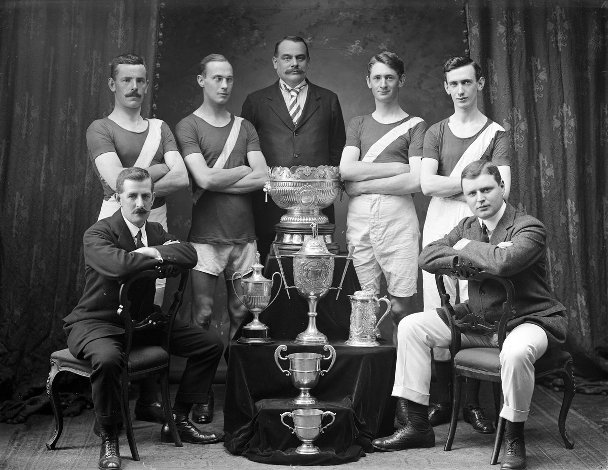 PurcellProps's tweet photo. Here's a photograph of the Waterford Boat Club (circa 1915) next to the collection of trophies they won 🏆 Nice one chaps. #ThrowbackThursday https://t.co/HTgwrFZ4yG