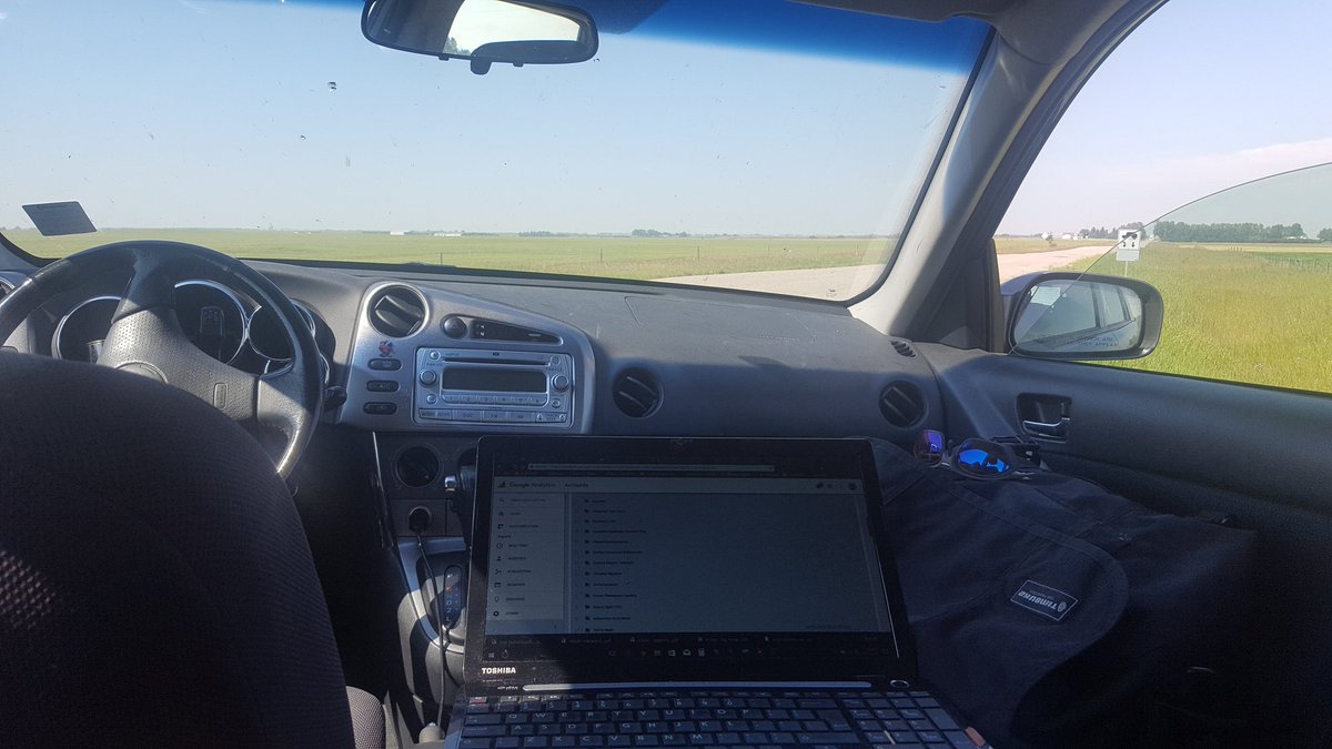 My version of a mobile <a href="/strongcoffee/">Strong Coffee Marketing</a> office. Mountain View Country scenery is great but would be better if I got out of the car.