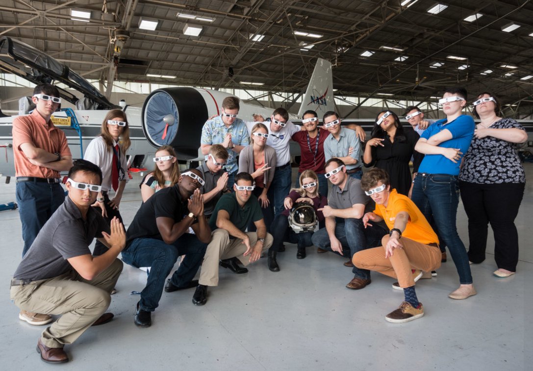 NASAJSCStudents's tweet photo. Striking a pose at Ellington for the #InternEclipse Photo Challenge! Stay tuned for the event of the century on August 21st! https://t.co/u1bxGZb1IU