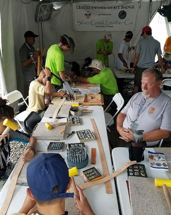 Realeather's tweet photo. ... the Leatherwork Tent keeps  projects dry and young people happy! #2017Jambo #leatherwork #leathercraft #scouting #realeather  Jamboree https://t.co/JTW0wHqiwu