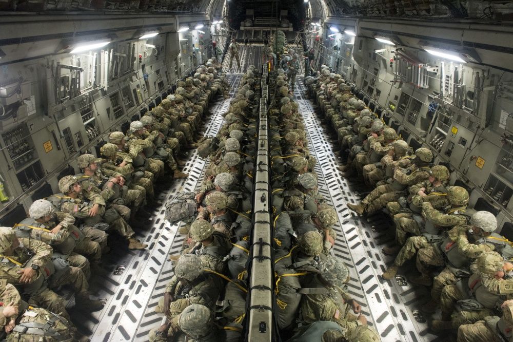 Red_State_Rebel's tweet photo. U.S. Army Paratroopers!
3rd BCT, 82nd Airborne Division, aboard a C-130 Globemaster III over training drop zone at Fort Bragg, N.C.  July 27 https://t.co/r4uUA0TIRX
