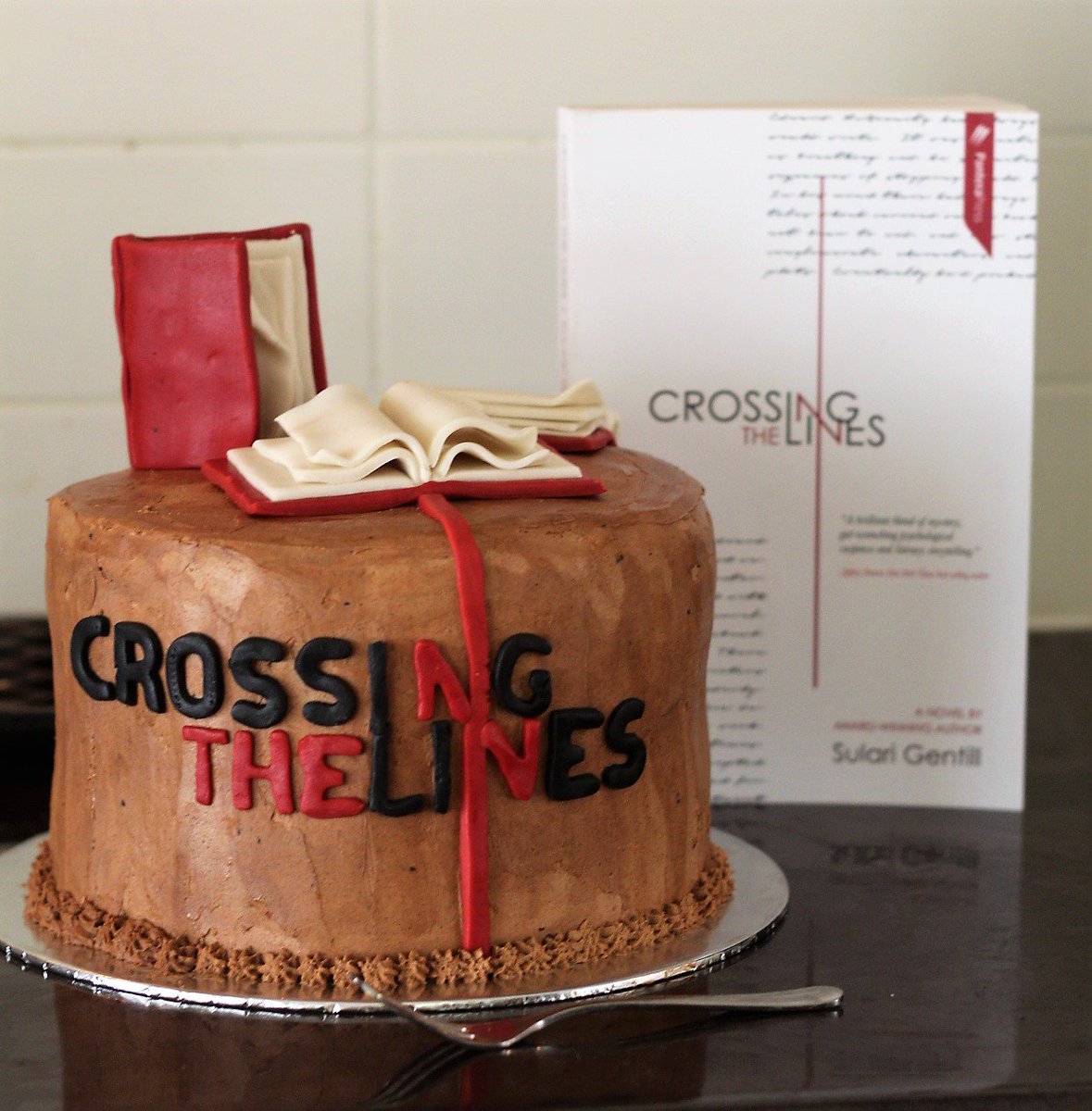SulariGentill's tweet photo. Crossing the Lines has a cake... it is now ready for release!  #crossingthelines #bookcake #panterapress #addcake #seeyagroundcontrol https://t.co/TIGoqnlb5X