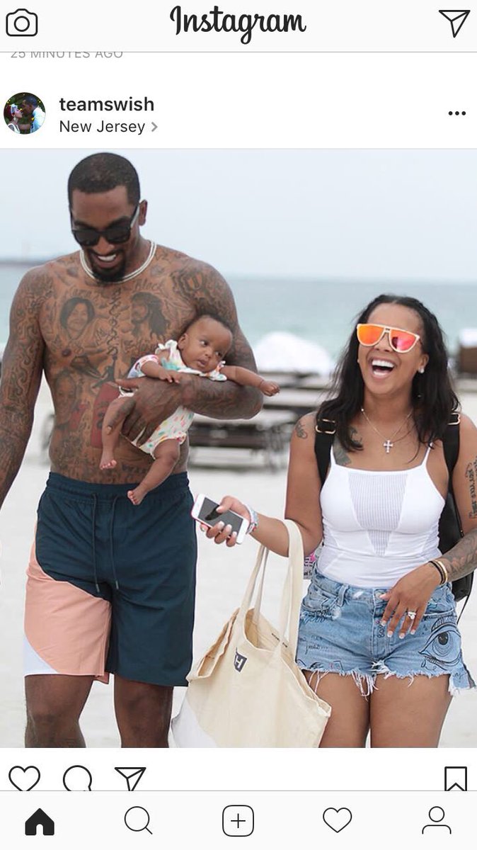 TheRealMayno's tweet photo. JR holding a baby exactly how id expect JR to hold a baby https://t.co/I6TWJpEEnT