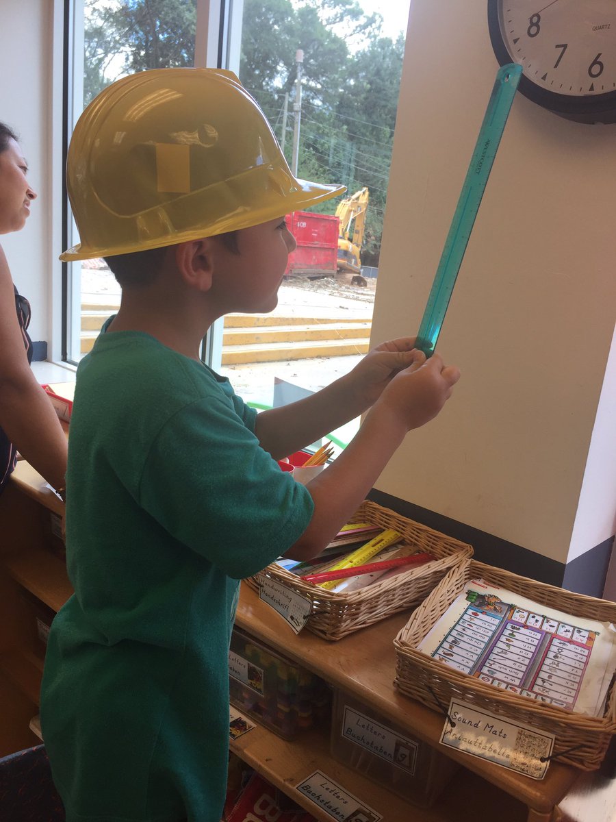 tclark210's tweet photo. Measuring how tall the excavator is. They decided 30 inches. @AIS_Eagles https://t.co/WVikhDSngm