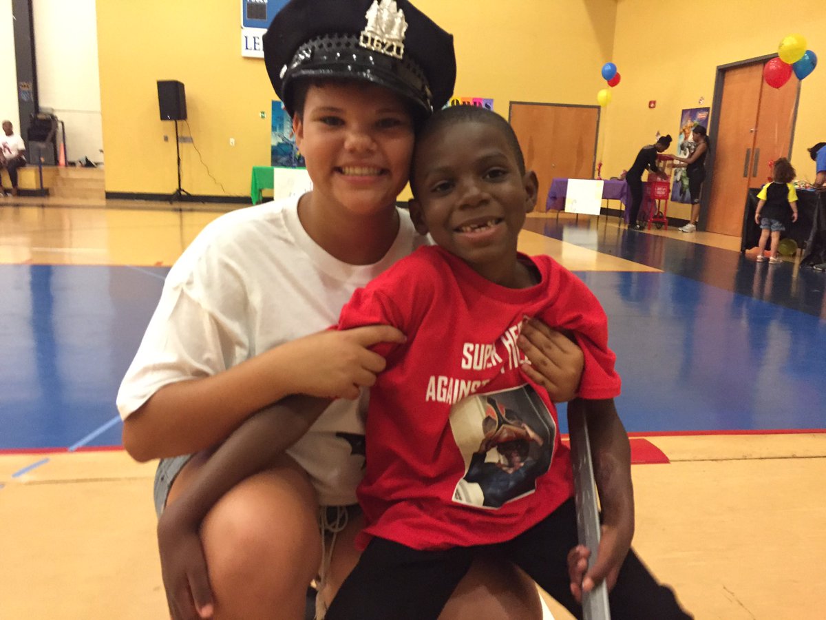 FarFarrAway's tweet photo. JuJu and her new "best friend" Haji, both kids survived getting shot in Philly last year. #SuperheroesAgainstGunViolence https://t.co/KovB3LiwDh