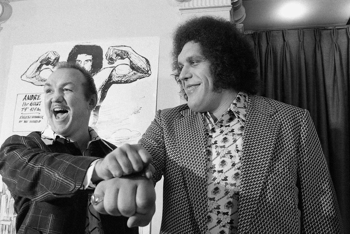 BoxingHistory's tweet photo. Chuck Wepner and Andre the Giant compare fists prior to their 1976 mixed rules bout, which Andre won by throwing Wepner out of the ring https://t.co/lEXo4tsnpp