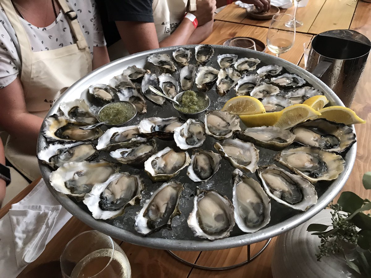 Salanth's tweet photo. Next up, we had Treasure Cove oysters with a nice tart cucumber mignonette! The baguette is a nod to the French. #DeltaLaunchpad #oysters https://t.co/VL6fMEuSTV