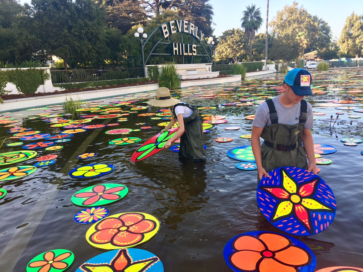 Eli and Natalie are volunteers ensuring the Lily Pond looks perfect for Beverly Hills BOLD nights! Join us Thurs, Fri and Sat from 8 - 10pm!