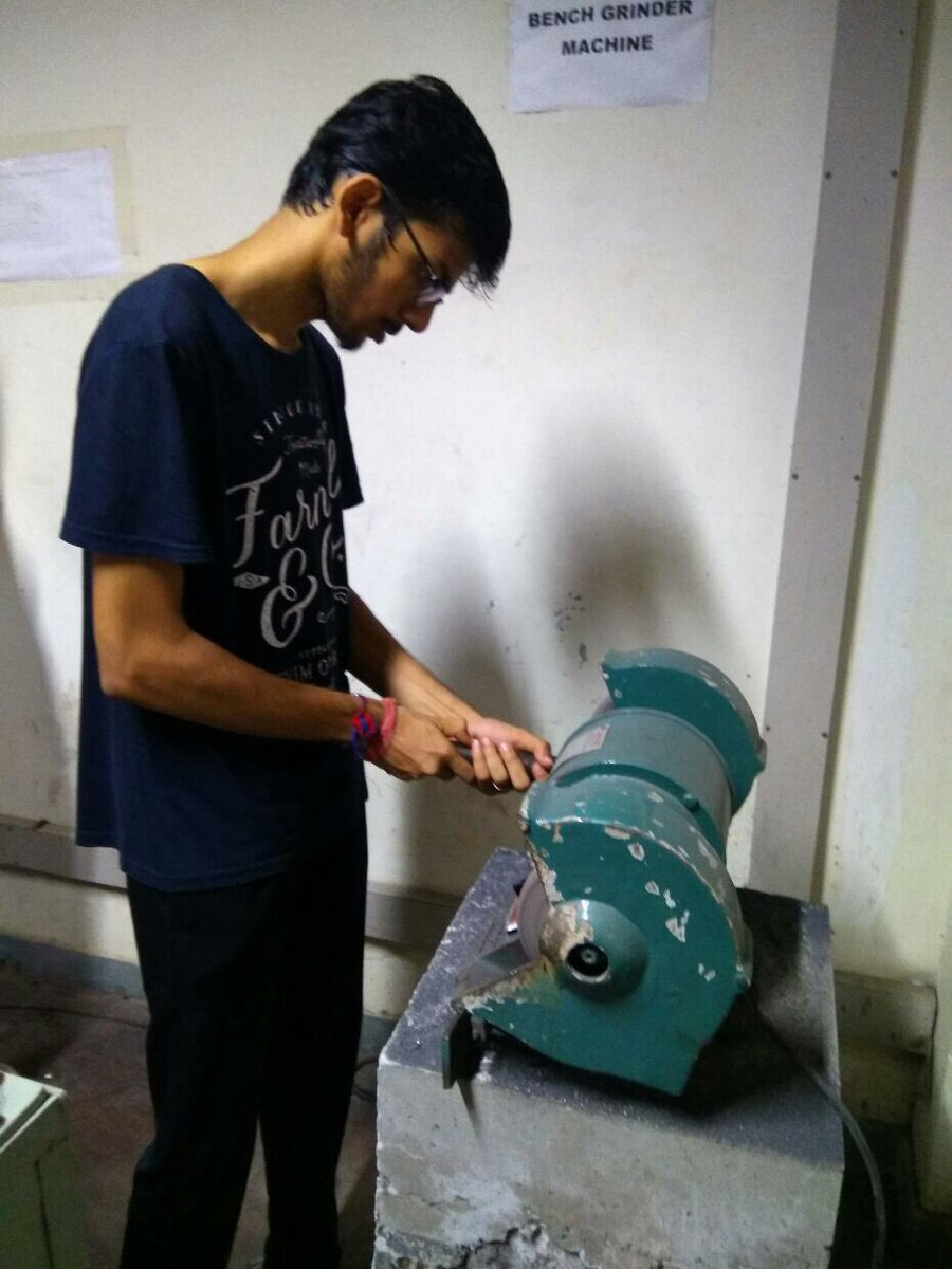 TeamGenesis3's tweet photo. The team getting their hands dirty. #Manufacturing #ATV #ESI18 https://t.co/bW4oNCufBk
