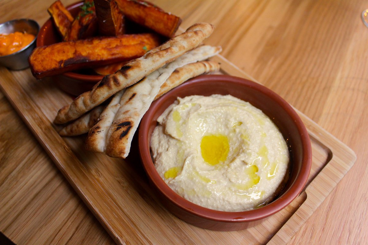 I know the weather isn't great, but be sure to stop by for some lunch. That desk probably needs a break as much as you!