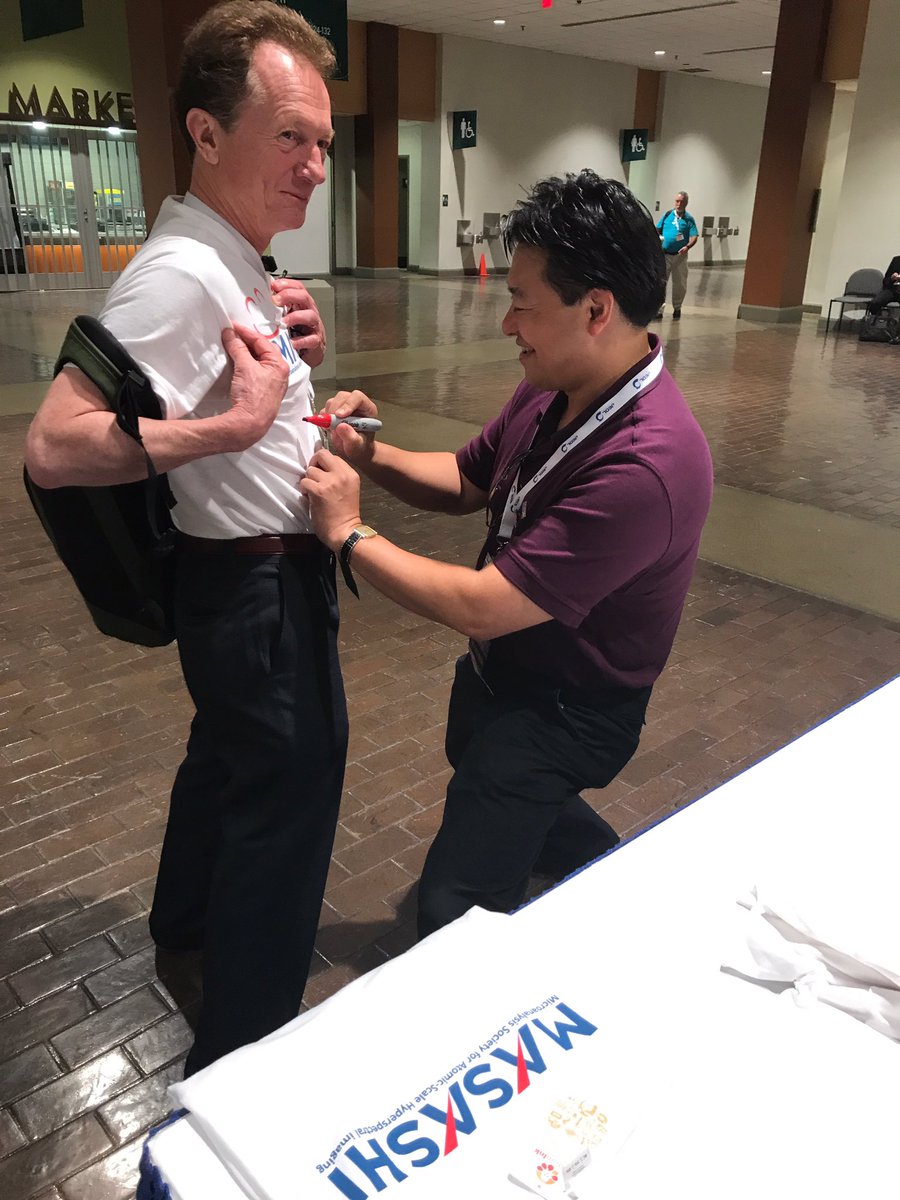 MicrobeamSoc's tweet photo. And our celebrity Prez signs the shirt of our past Prez. Signatures in high demand. #CollectorsEdition #MM2017StL https://t.co/O8d3lWM3lK