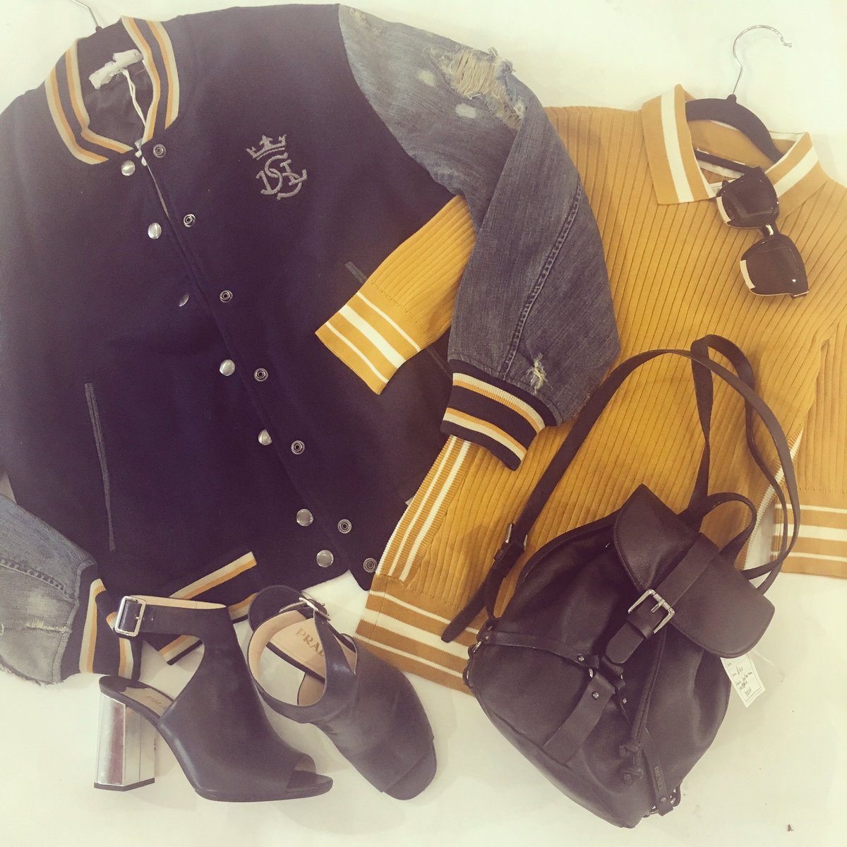 ArchLabelAgency's tweet photo. We've gone #schoolchic for you this #Tbt, #diesel bomber & backpack, #Prada shoes, #londonretro sunnies & #toryburch top โ๏ธ #sunsout โ๏ธ https://t.co/2IAboqIfEw