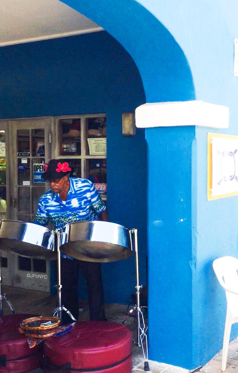 JPoNYC's tweet photo. You can almost hear the #steeldrums singing it's sweet #carribeantunes. #takemeback #tbt #bermuda #bluebuildings #musica #musictomysoul https://t.co/P2ZEd8q6Vk