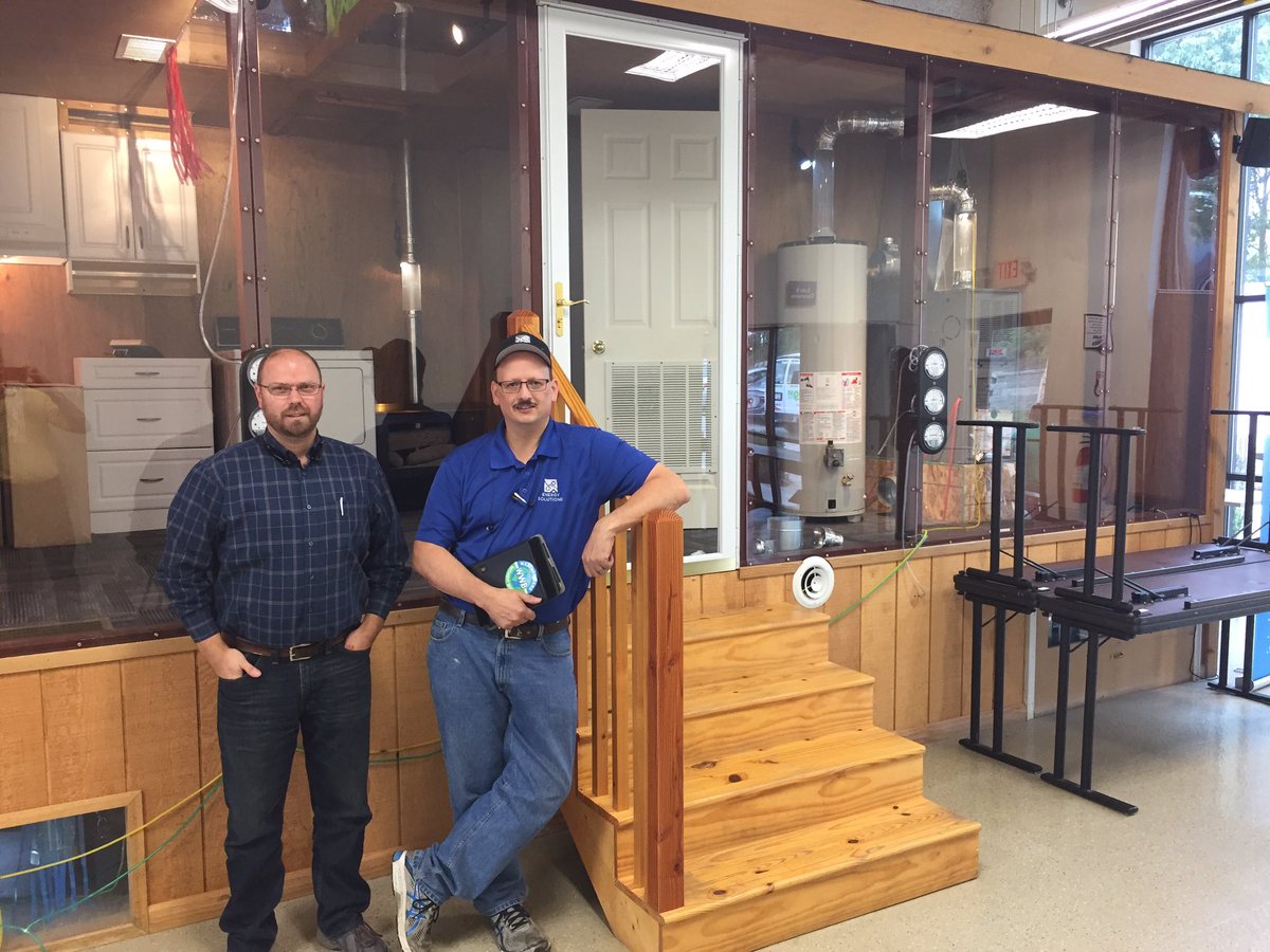 Got a tour of the Community Housing Partners training facility today. That's Phil Hull &amp; Anthony Cox in front of a huge House of Pressure.