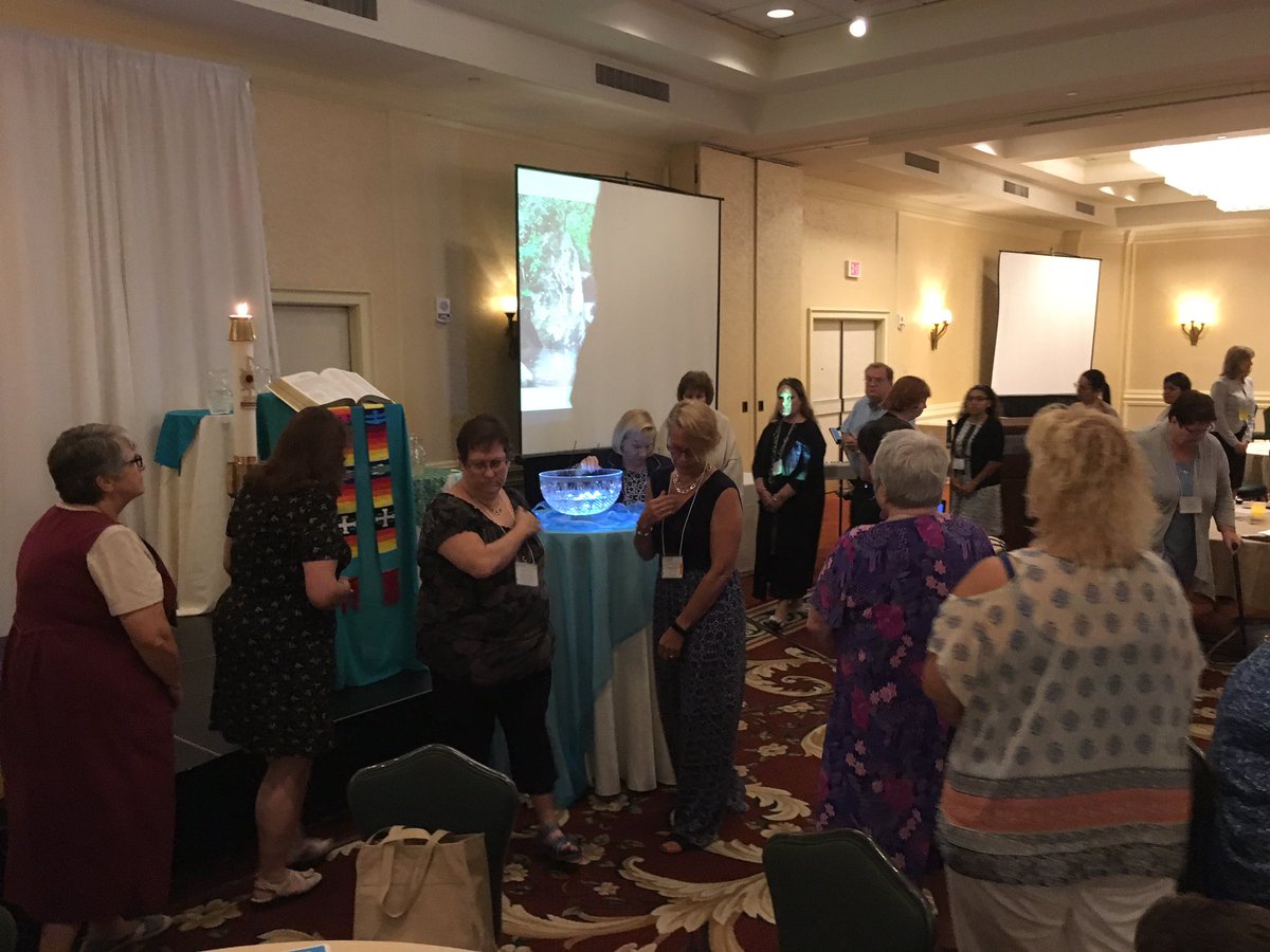 NECDDRE's tweet photo. Participants bless themselves with the combined holy waters, as a reminder of their baptism. ✝️💧 #NEConvo https://t.co/H6mhA5SDS7