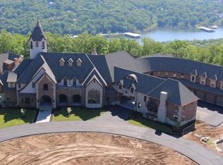 JoshDMartin's tweet photo. What I've been told is a house Cole Hamels was building on Table Rock Lake. https://t.co/2PzGxwfc7F https://t.co/mqqFEQkJpu