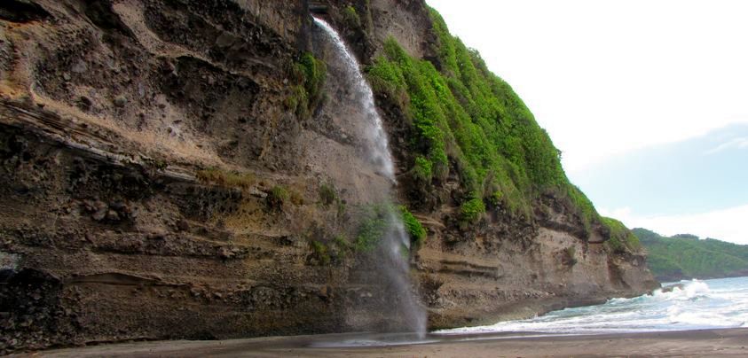 Fancy a challenge ? Try the cliff climb to the Wavine Cyrique waterfall on the east coast of #Dominica #travel #Caribbean
