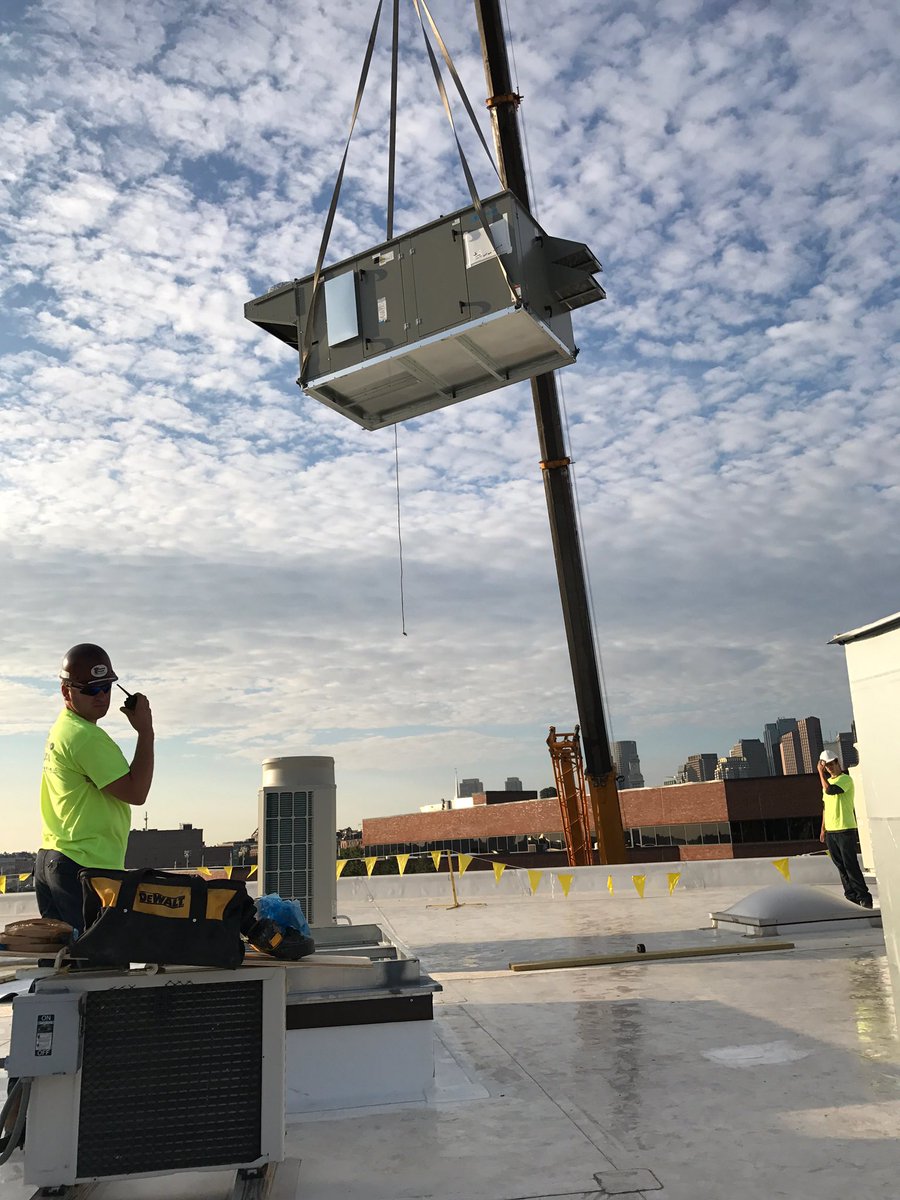 PremierMechLLC's tweet photo. Safe and successful landing of an ERU and condensers at MGH Institute of Health Professions #premiermechanical #triborocrane @WiseBuilds https://t.co/CaDu84hkrH