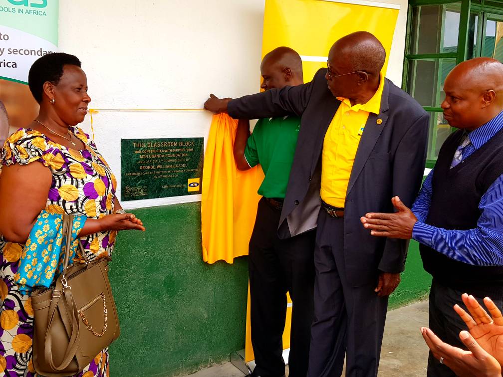 BryanMbasa's tweet photo. Today, the @mtnug Foundation chairman opened the newly built 4 classroom block & 9 stance toilets at PEAS High School Kichwamba. #educ4all https://t.co/fPm0XF2UNO