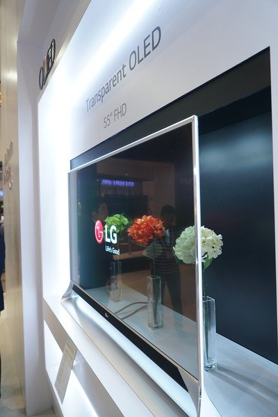 DisplayWeek's tweet image. &quot;Through the looking glass,&quot; or rather looking through this transparent OLED display @LGCommDisplays from #DisplayWeek17 #FlashbackFriday