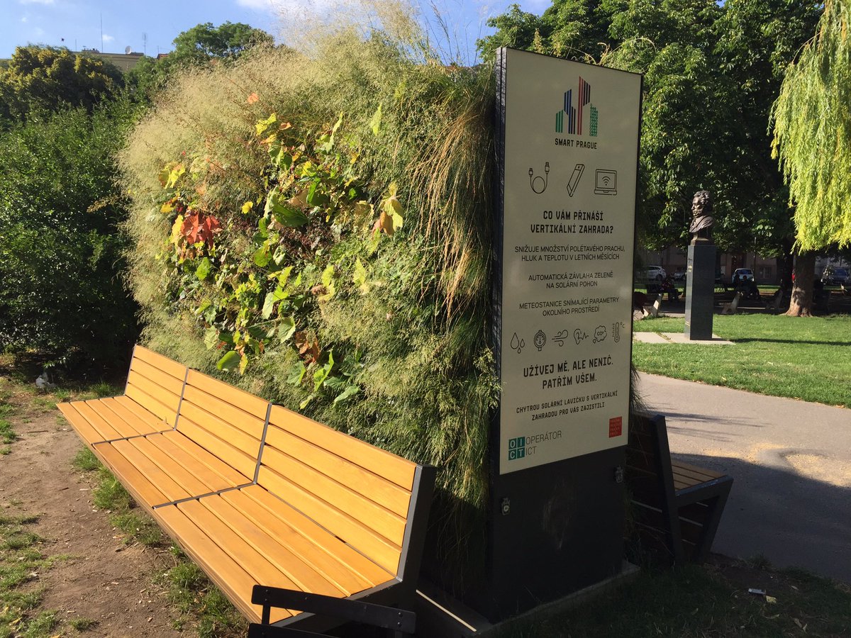 eOliverWhite's tweet photo. My neighborhood in Prague is doing some great stuff: free book drop, solar garden charger, and little tables in my local square for picnics https://t.co/pOVV31pokd