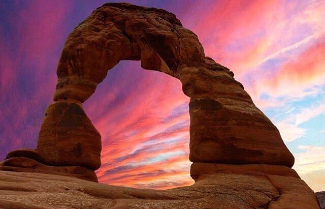 mountainbased's tweet photo. Cotton candy filled skies at Utah's Delicate Arch. Photo by @utahphotoproject #MountainBased #UtahExplored #LetsGoHiking https://t.co/vlams7sZcR