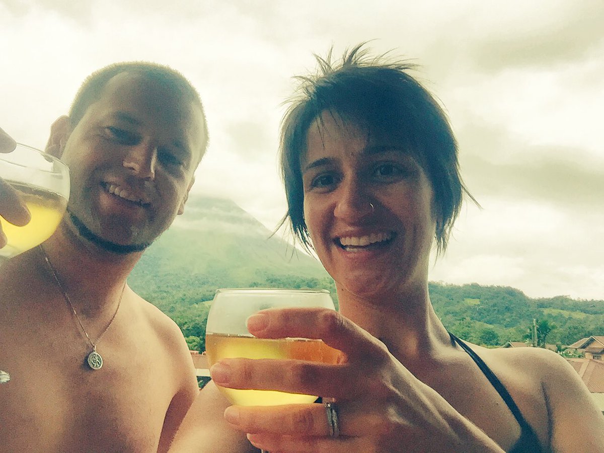 J_essp's tweet photo. Thanks to the crew on our @British_Airways flight to San Jose for the honeymoon champagne,we're enjoying in front of Volcano Arenal. Cheers! https://t.co/drY1qv9V6z