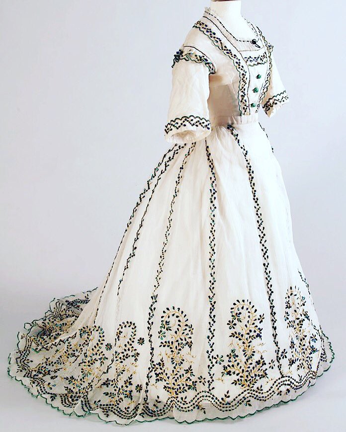 kateStrasdin's tweet photo. Whilst we would flinch from this kind of embellishment today, mid-19thc beetle wing embroidery was all the rage, dress c1865 @KSUMuseum https://t.co/G26hfREbBN