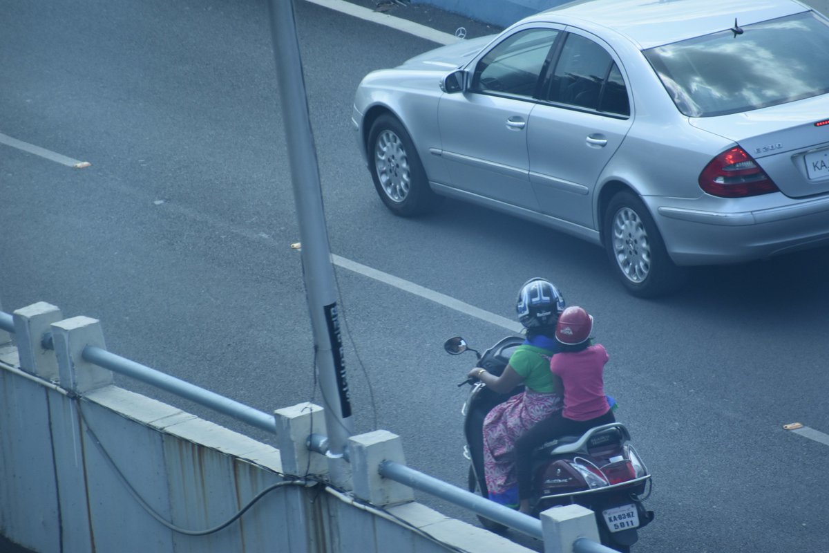 Big Salute to this lady, who loves her kid, knows responsibility to make her kid wear helmet. You are role model to many. 👏