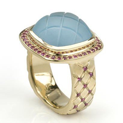 One of my favourite rings! 18k yellow gold with carved blue topaz and pink sapphires around the topaz and in the q… ift.tt/2vYecyX