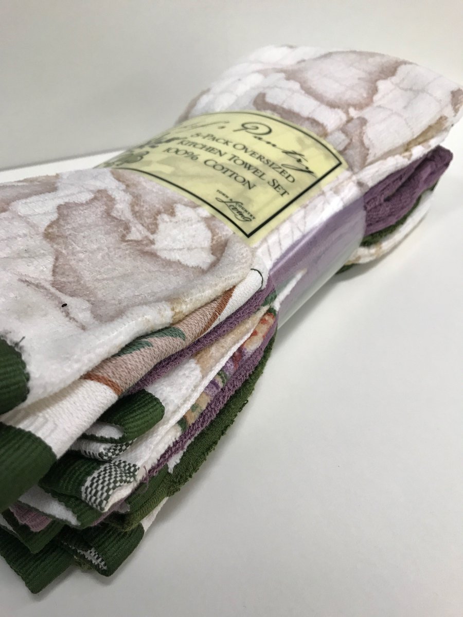 LaundryBundling's tweet photo. Beautifully bundle kitchen #towels with printed material! Looks even better on the store shelves! #LaundryBundling https://t.co/ScyziR96BC