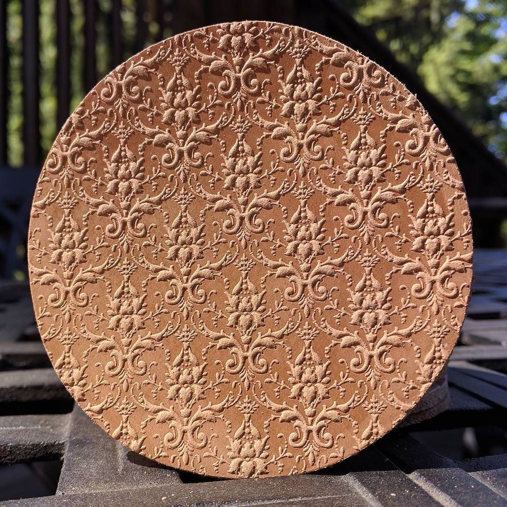 tactilelightllc's tweet photo. #Damask pattern on a pressed leather #rounder. #leatherwork #leather #stamp #lasercut #laserengraved #pattern https://t.co/KJoZR8IrJy https://t.co/EpTMcr3LFb