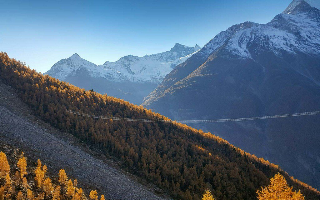 TravelLeisure's tweet photo. Switzerland just opened the world's longest pedestrian suspension bridge https://t.co/IORs74b4Bq https://t.co/uC1dxEeaTQ