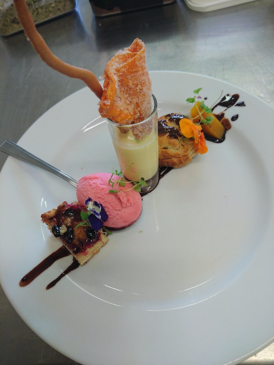 HotelHastings's tweet photo. Our delicious Assiette of Pannacotta, frangipane almond fruit cake, 
passionfruit jelly, sorbet and chocolate covered profiterole https://t.co/EDbmdkK64b