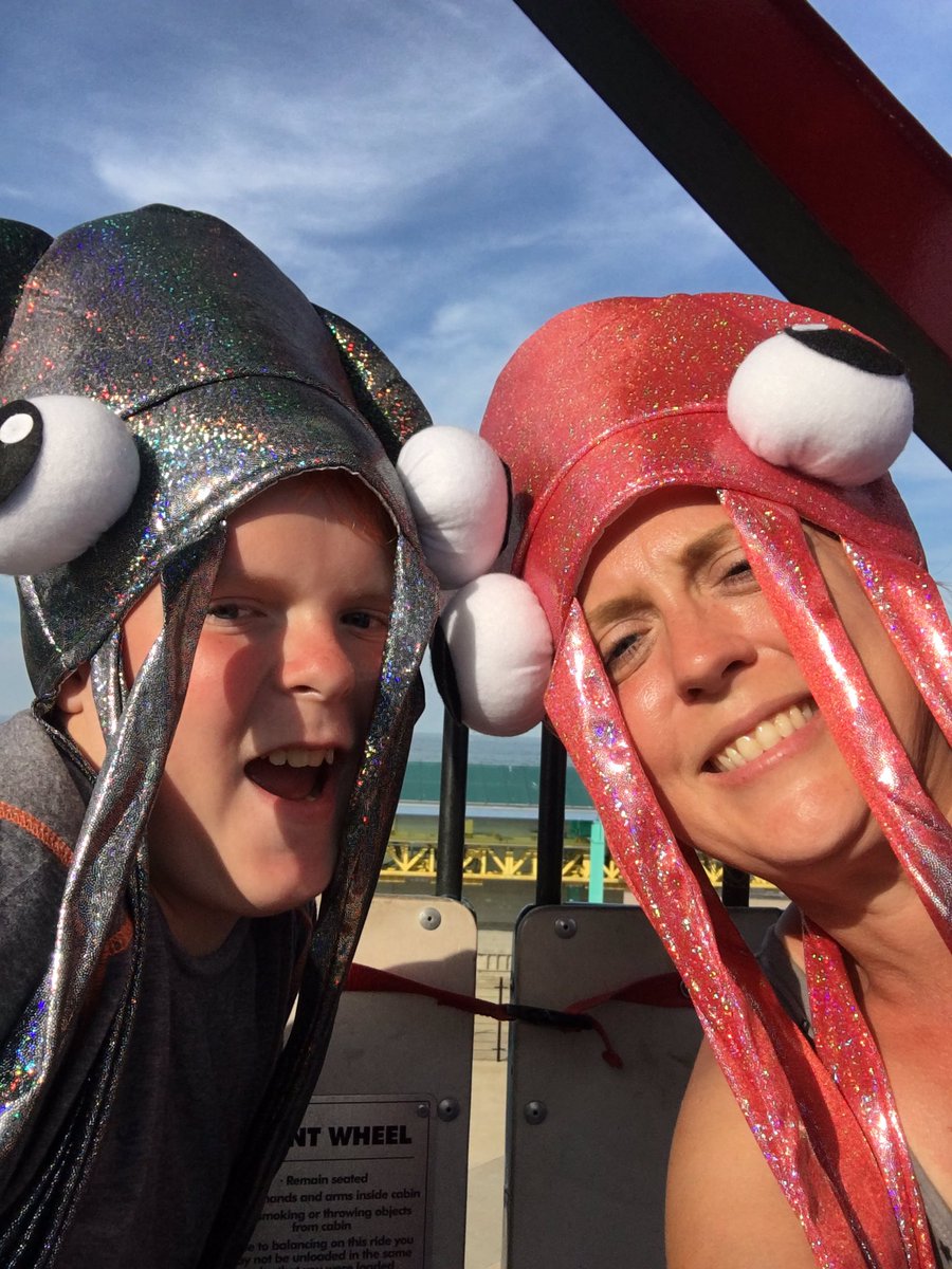 nightshadecraft's tweet photo. Highlight of my #cedarpoint trip:  Ferris wheel and squid hats with my monkey. https://t.co/qeo3GCvWBa