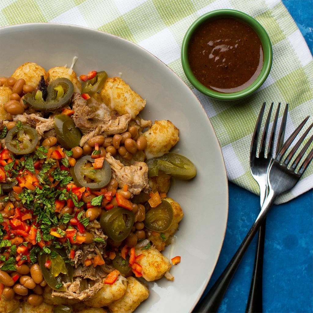 Fred_Meyer's tweet photo. Pile pulled pork, melted cheese, and @BushsBeans over crispy tots and you’ve got #SummerIsDelicious BBQ #Totchos. https://t.co/5LAjbH71LO https://t.co/sW7P0pXVFH