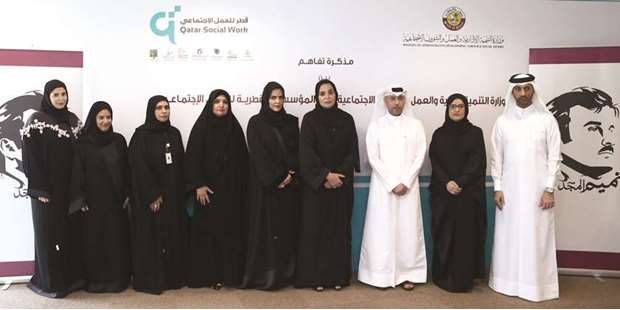 GulfTimes_QATAR's tweet photo. Labour ministry, #QFSW sign pact https://t.co/eA4lSoD8Mg https://t.co/Q67Lc5S7pO
