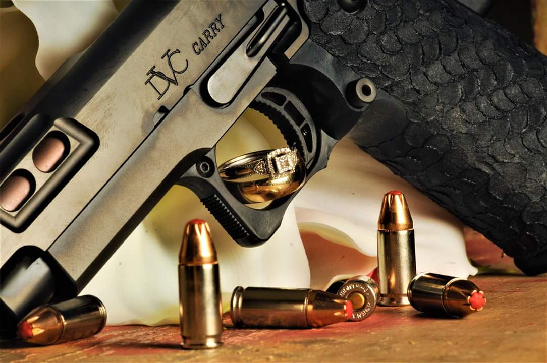 pewpewnation's tweet photo. Wedding photography @RTBAfirearms style. #Guns #wedding #photography #sti #dvccarry #rings #bullets #ammo https://t.co/IVAXEoaH2I