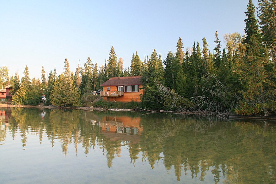 Our deluxe #cabins have bay windows over looking the #lake, a walk out #deck, and more! Have you stayed in one of our deluxe cabins yet?